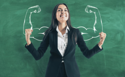 Confident woman showing strength symbolizing personal development - The Power Withinn